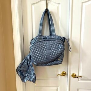 Oliver Thomas “Kitchen Sink” tennis bag. The color is called Ice Queen